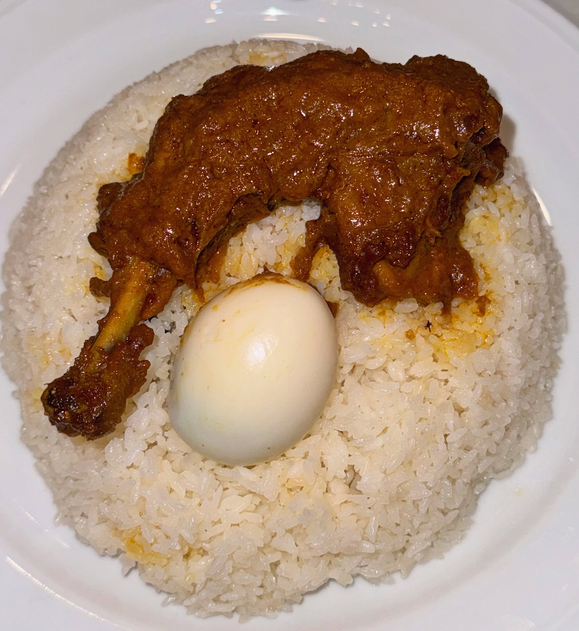 A plate of morog polao (chicken pulao)